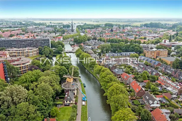 Taxi van Weesp naar Schiphol Airport